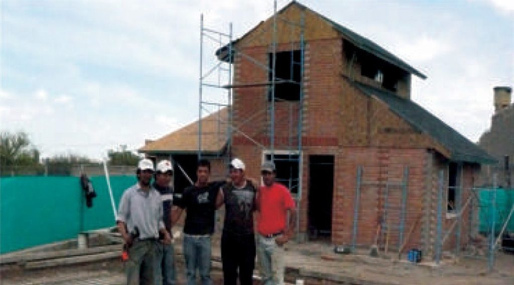 Terminaciones en ladrillo visto y pizarra