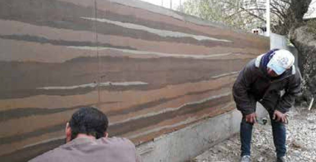 Muro tapial en la Regional Merlo