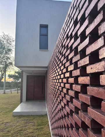 La casa de la pared de ladrillos